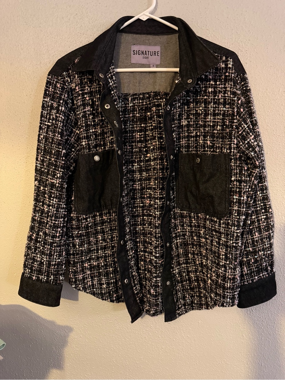 Signature Black and White Tweed Jacket with Leather-Trim Pockets